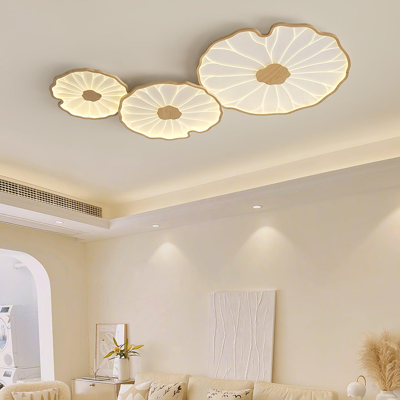 Clérachic three-shade ceiling light in light wood-grain finish above a cream room with an arched doorway.