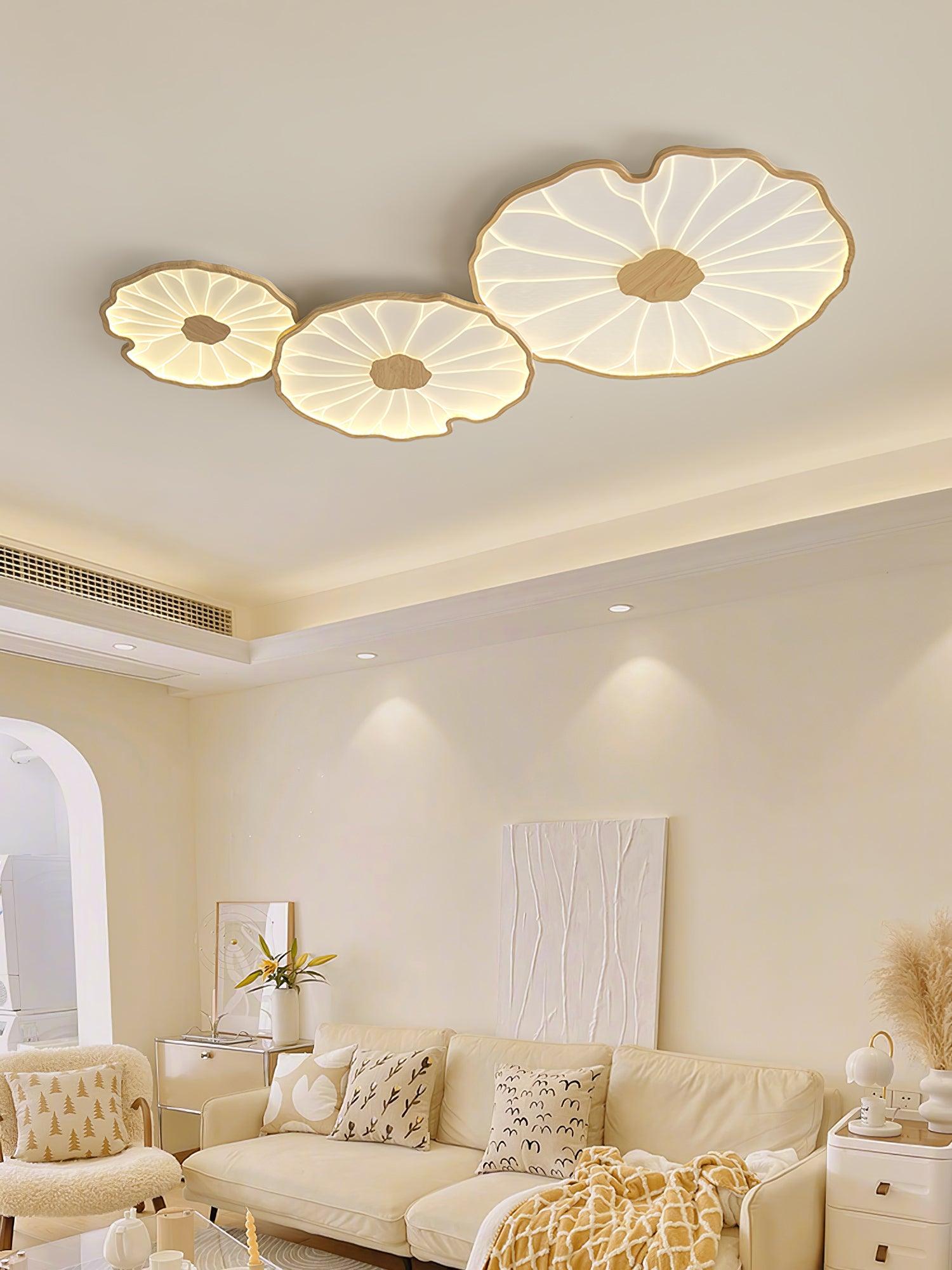 The Clérachic three-shade light in light wood-grain finish, a closer view of the arched-doorway living room.