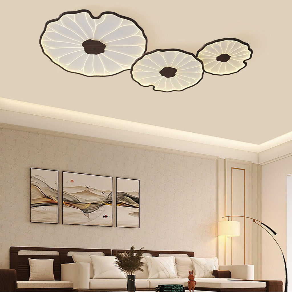 Clérachic three-shade ceiling light in dark walnut finish, a tighter crop near framed landscape art.
