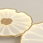 Clérachic ceiling light macro shot of two overlapping shades, wood-grain rim and ribbed acrylic in focus.