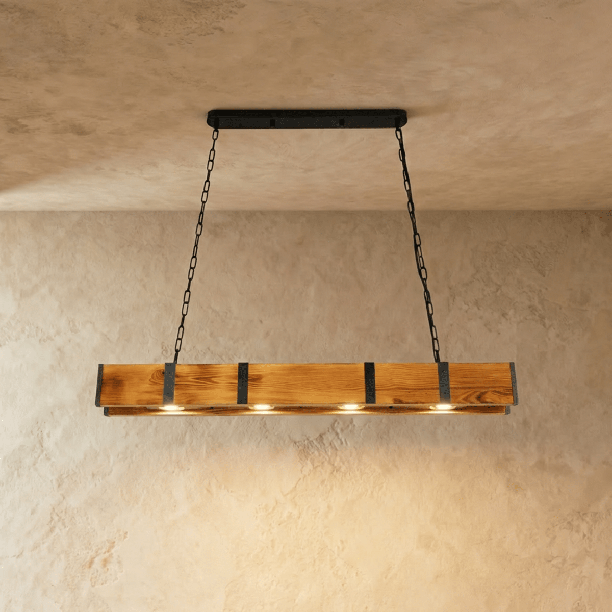 Clérachic rustic timber bar pendant with black iron straps, four warm bulbs along its underside, hung on two black chains.