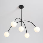 A black Clérachic chandelier with five lit globes on arched arms, seen from below, with a round black ceiling canopy above.