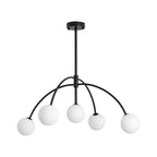 Front view of this black Clérachic chandelier, with five white globes and arched arms and a short rod, on a white backdrop.