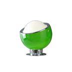 The smaller size of this Clérachic table lamp in bright green, with a white dome, chrome rim and a short chrome base on white.