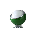 A dark-green version of this Clérachic table lamp, with a white dome, chrome ring and a round chrome base, on a plain white backdrop.