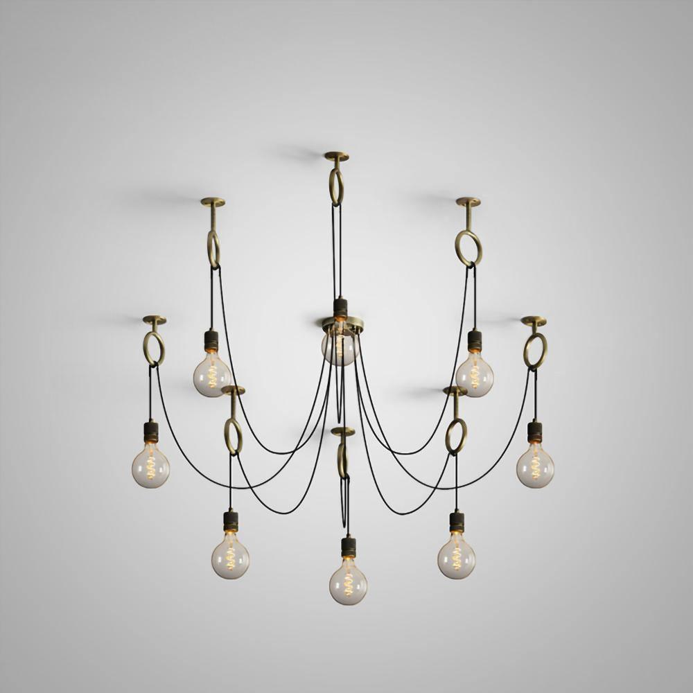 The nine-head layout of this Clérachic pendant on a pale grey backdrop, each cable looped through a copper ring above its own bulb.