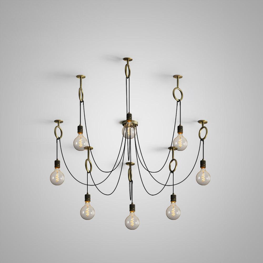 Nine amber-glass globe bulbs on black cables hang below copper hook rings in a fan, shown for this Clérachic pendant on a grey studio backdrop.