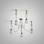 Six globe bulbs hang on black cables from copper rings around a round canopy, a mid-size layout of this Clérachic pendant on grey.
