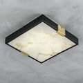 The Clérachic Square Alabaster Flush Mount Ceiling Light against pale marble, its slim black frame only 5.5 cm deep with veining across the stone.