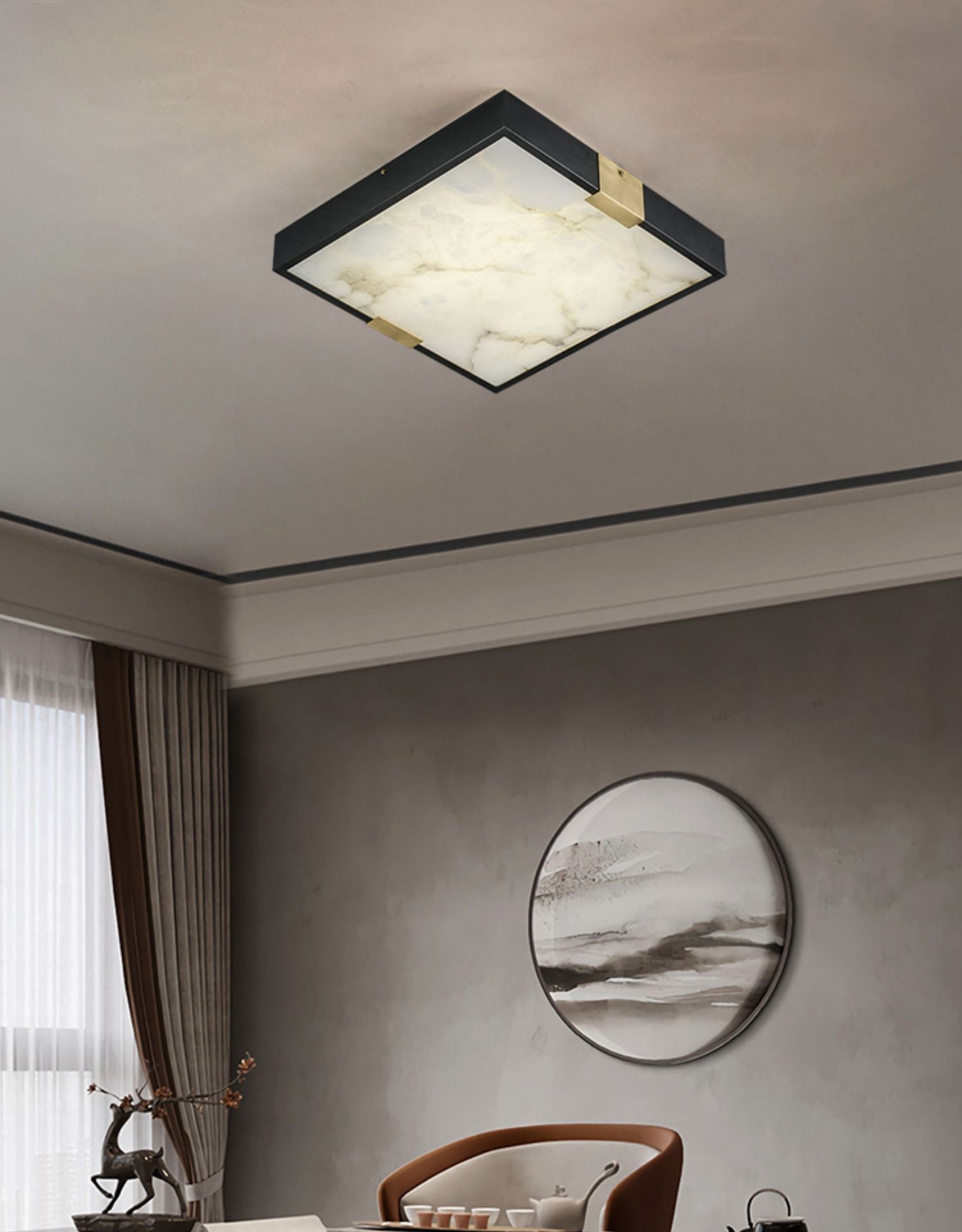 Clérachic Square Alabaster Flush Mount Ceiling Light lit above a tea table, the stone panel throwing a soft even wash over the ceiling.