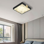 Clérachic Square Alabaster Flush Mount Ceiling Light lit in daylight over a bedroom, shallow enough at 5.5 cm to clear a low ceiling.