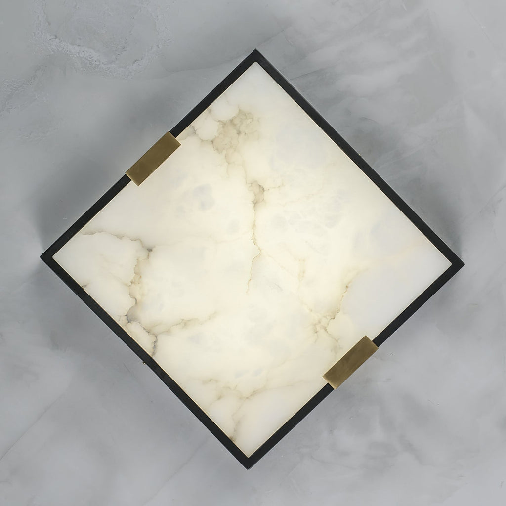 Clérachic Square Alabaster Flush Mount Ceiling Light shown face-on and turned to a diamond, brass saddles gripping two opposite corners of the frame.