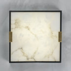 Clérachic Square Alabaster Flush Mount Ceiling Light straight on, the full alabaster panel framed in black with a brass saddle at either side.