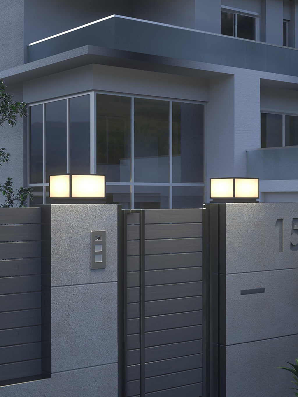 Clérachic square post lights on grey gate pillars beside a slatted gate, in front of a modern house at dusk.