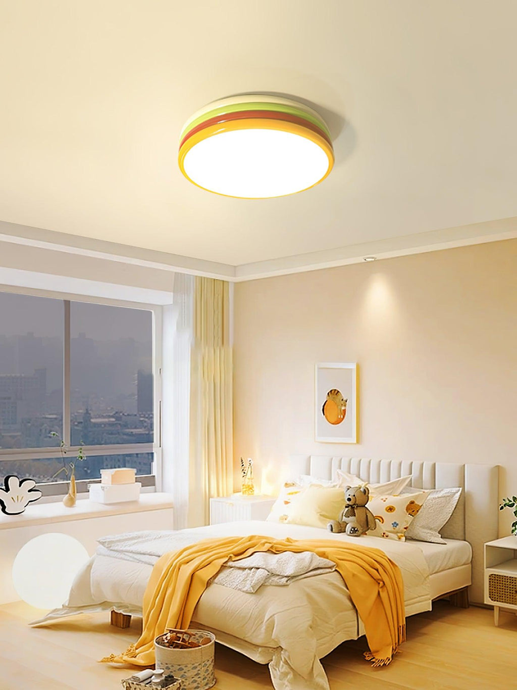 A Clérachic ceiling light in a lighter lime and orange-red version, glowing above a child's bedroom with a yellow throw.