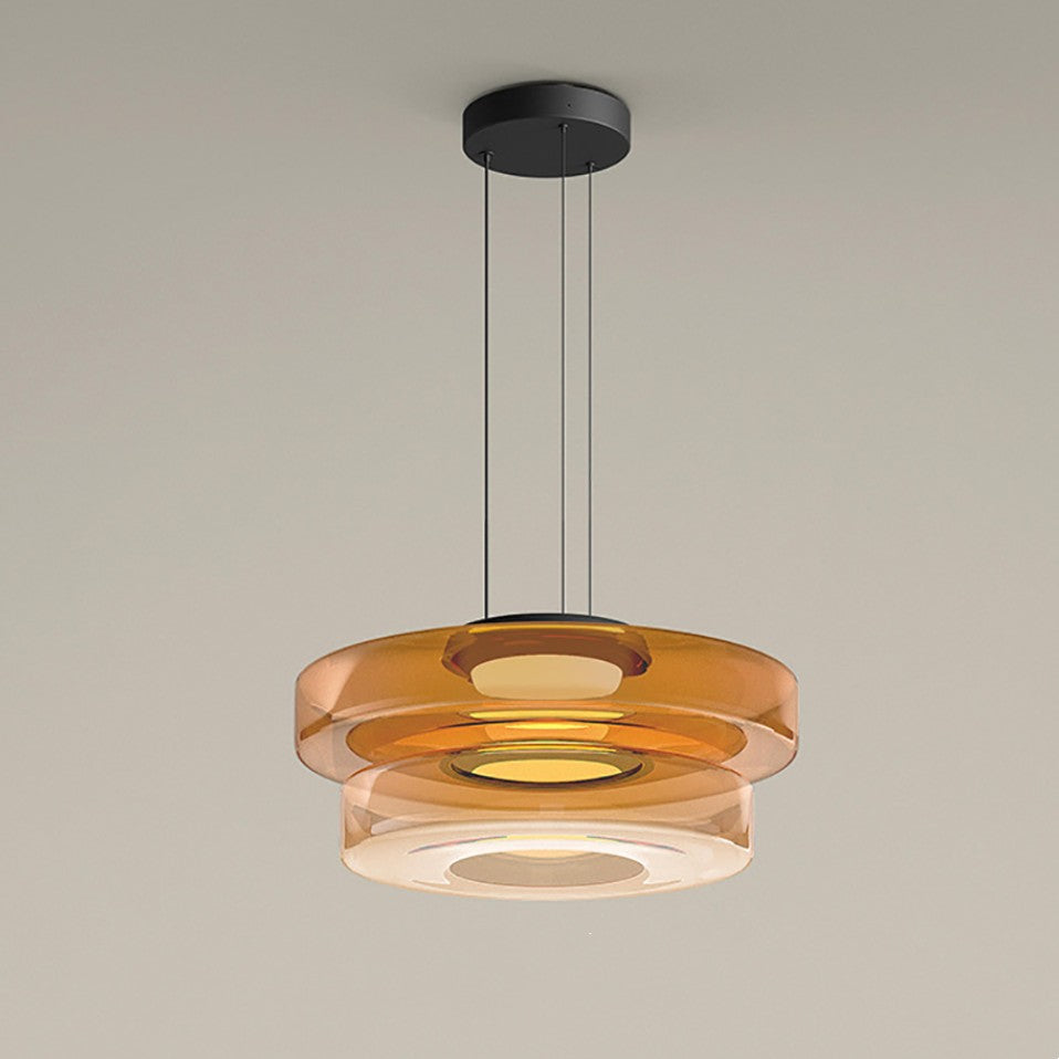 Two-tier amber build of the Clérachic Stacked Glass Disc Pendant Light, the lower drum noticeably paler than the disc above it.
