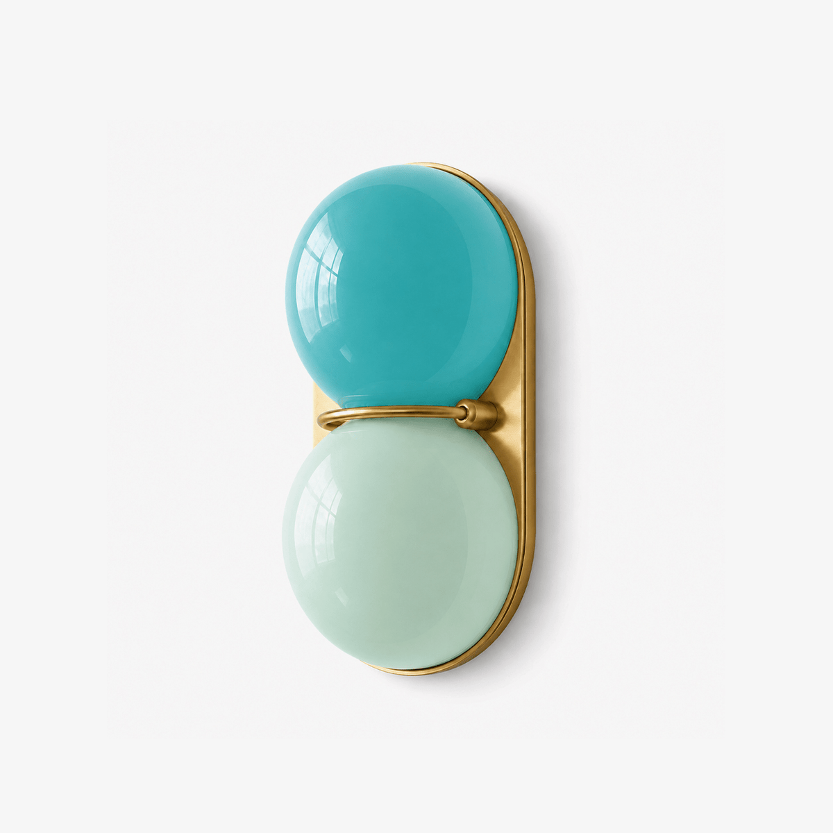 Turquoise and pale mint glass globes stacked on a gold-toned backplate, this Clérachic wall light shown on a plain white backdrop.