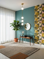 Four-globe Clérachic pendant in a hallway with a teal feature wall, a geometric wallpaper panel, a round mirror and a console table.