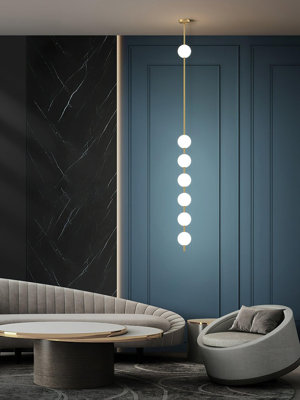 Six-globe Clérachic pendant in a lounge with a blue panelled wall, a dark marble panel and a curved grey sofa.