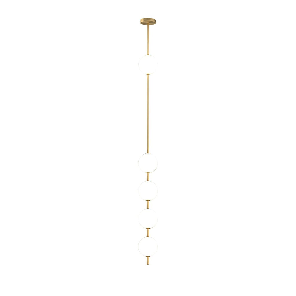 Clérachic brass-column pendant with four white globes on a plain white backdrop, shown small and tall, with the globes spaced down the lower half.