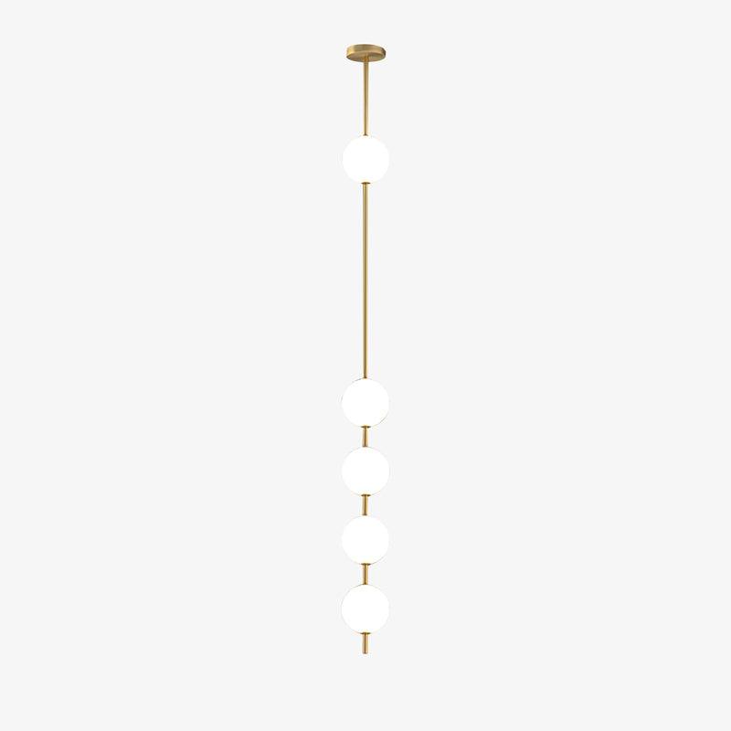 Four opal globes grouped on the lower part of a long brass rod, from a Clérachic pendant on a light backdrop, with a round ceiling plate.