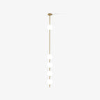 Clérachic pendant with four opal globes on a slim brass column, shown in full against a plain light grey backdrop.