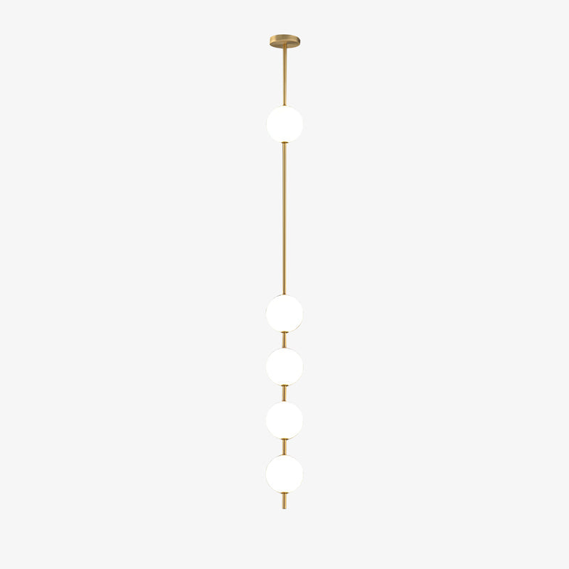 Five opal globes on a thin brass column from a Clérachic pendant, shown on a plain white backdrop with a small brass ceiling plate.