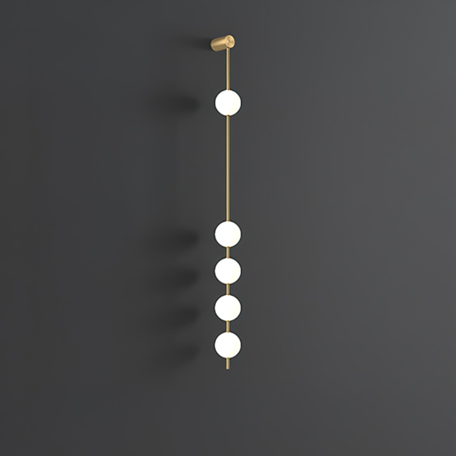 The Clérachic Stacked Globe Wall Sconce in brass, lit, five globes glowing against a dark grey backdrop.