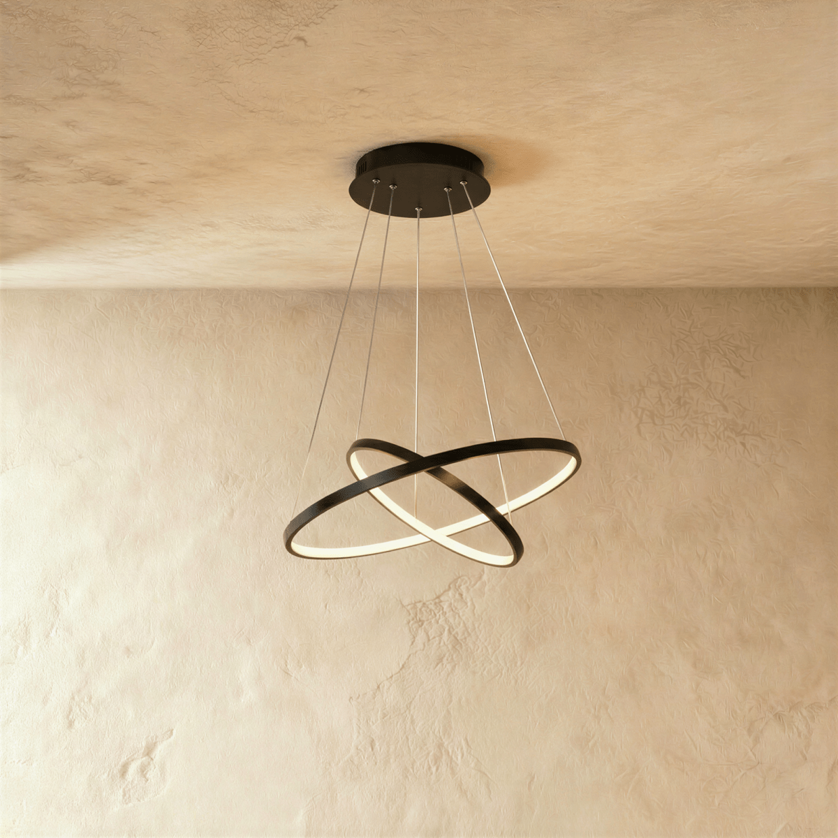 Clérachic's two-ring black pendant crosses its rings like an X, suspended on five fine cables from the ceiling.