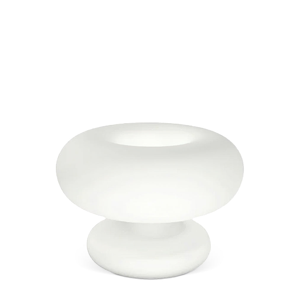 Frosted white Clérachic donut lamp on a white background, shown at a slight angle with its open ring top and rounded base.