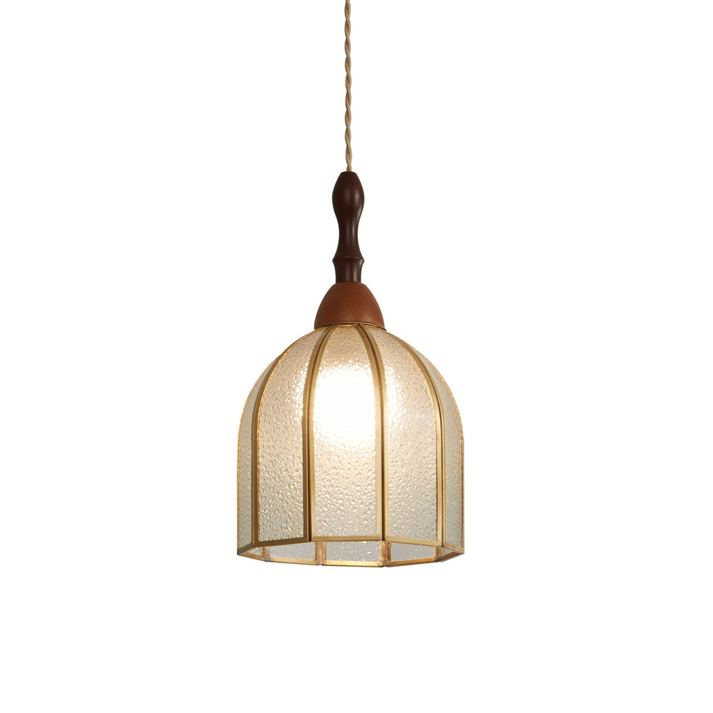 Clérachic pendant with a domed shade of textured clear glass in brass ribs, a turned wooden finial and a twisted cord, on white.