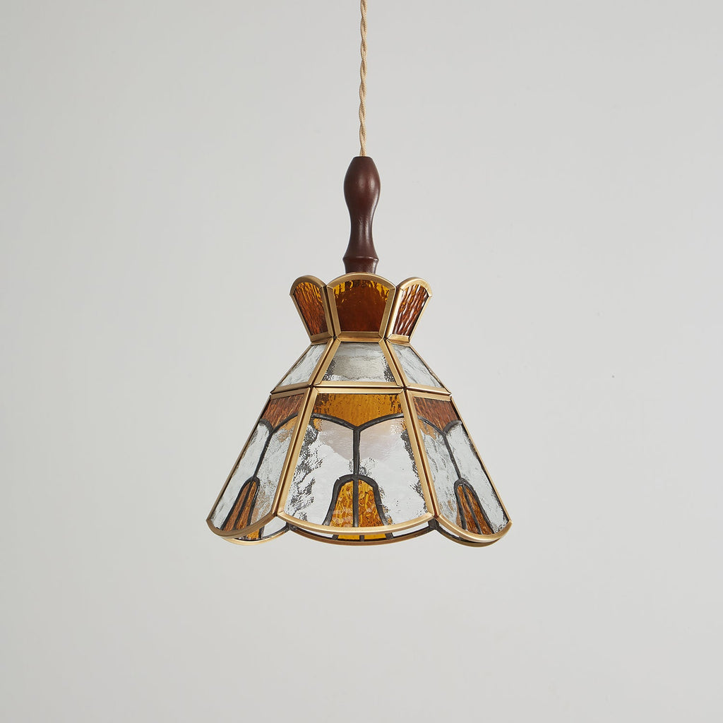 Unlit Clérachic pendant with a stepped amber crown, clear rippled glass and amber teardrop panels in brass came.