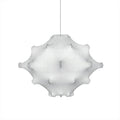 A smaller white Clérachic pendant with the same dimpled form, hung on a thin cord against white.