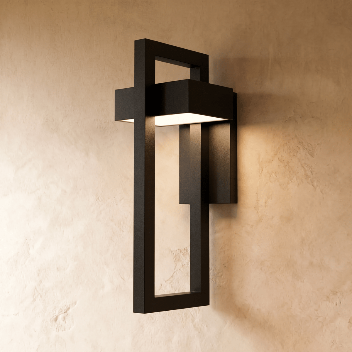 This Clérachic wall light's acrylic strip glows warmly inside its black steel geometric frame on a plaster wall.