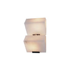 Cut-out view of a two-block Clérachic alabaster wall light, the stone softly lit and offset step by step.