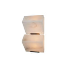 A smaller cut-out view of a two-block Clérachic alabaster wall light on white, the blocks glowing warm above black plates.