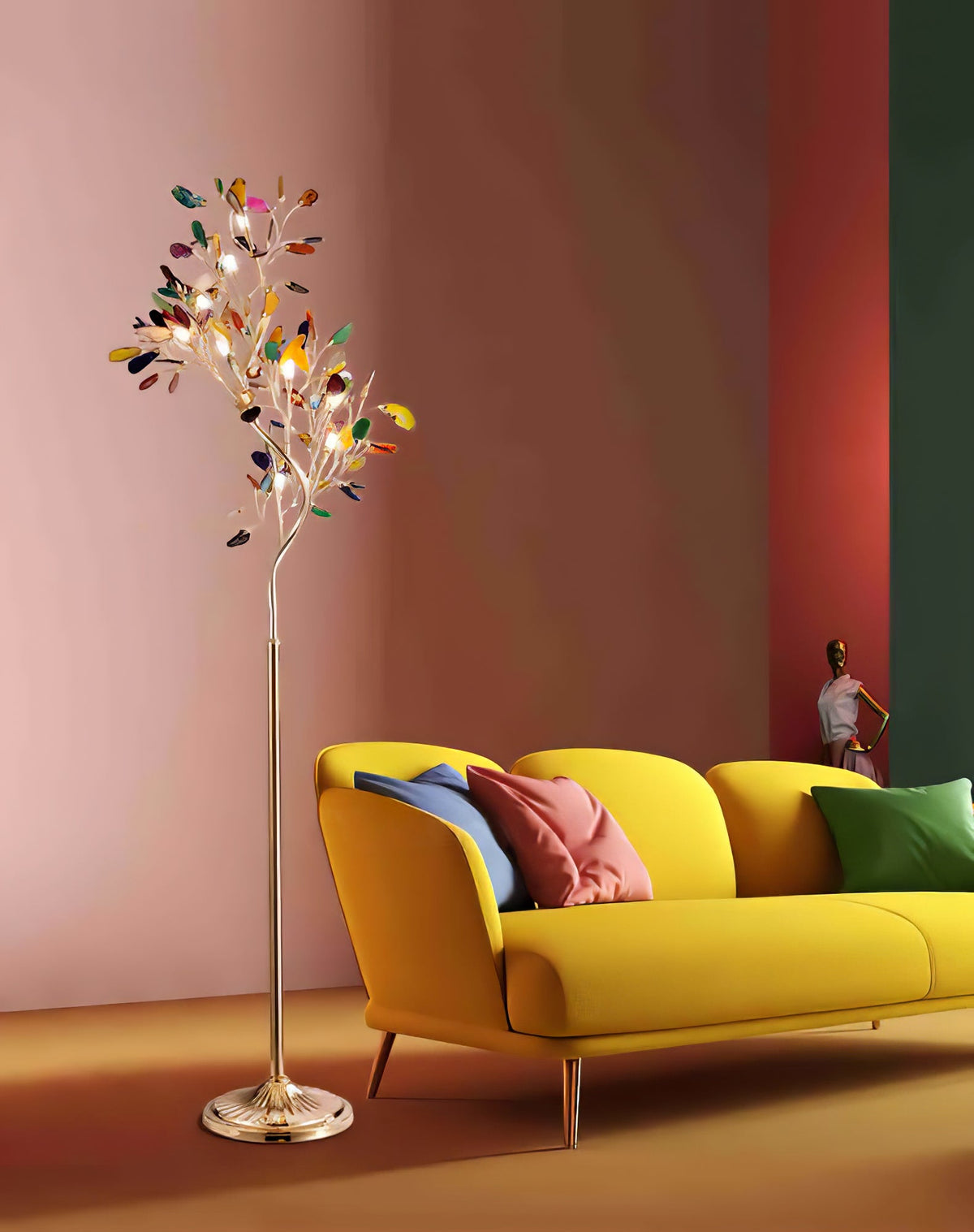 Lit Clérachic agate floor lamp against a coral-pink wall, beside a yellow sofa with pink and green cushions.