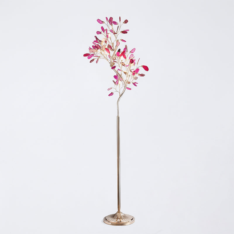 Clérachic agate floor lamp with pink and magenta slices on thin gold branches, on a pale grey backdrop.
