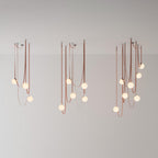 Three sizes of the Clérachic Strap-Hung Glass Globe Pendant Light shown side by side, comparing the three-, five- and nine-head clusters.