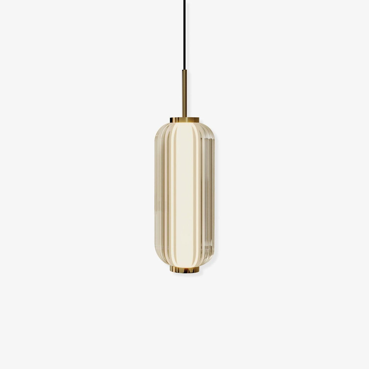 A ribbed glass cylinder Clérachic pendant with a gold stem and caps, in a champagne-tinted version on an off-white backdrop.