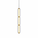 A slim three-tier Clérachic pendant in clear ribbed glass with gold collars, lit with a warm inner tube on white.