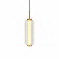 A ribbed clear glass cylinder Clérachic pendant with a lit inner tube, a gold stem and gold caps, on a white backdrop.