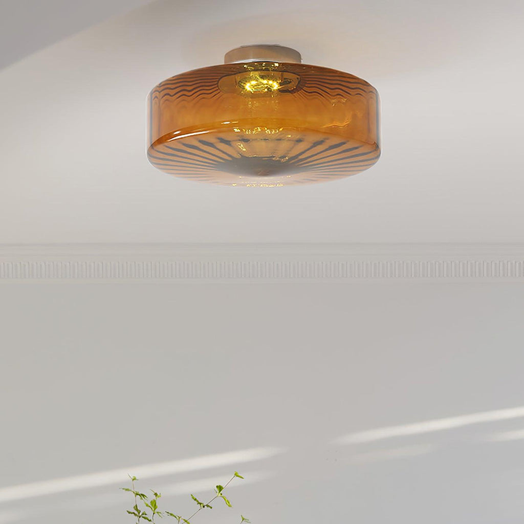 Clérachic Sunburst Amber Glass Flush Mount Ceiling Light above a moulded picture rail, sitting tight to the ceiling with no drop at all.