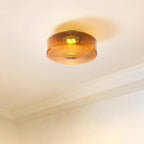 Clérachic Sunburst Amber Glass Flush Mount Ceiling Light warming a bare ceiling above deep cornice moulding in a quiet corner.