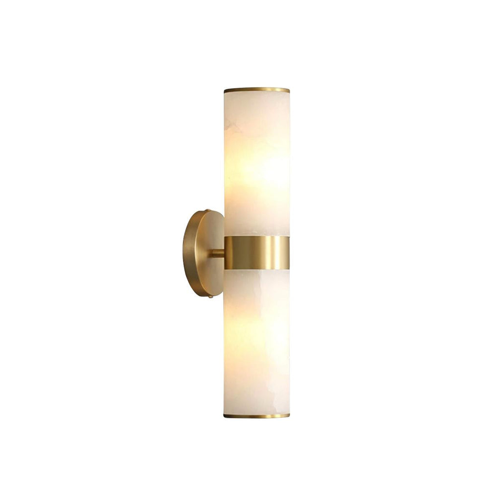 Clérachic Sway sconce on a clean white studio backdrop, showing the brushed brass collar and alabaster tubes.