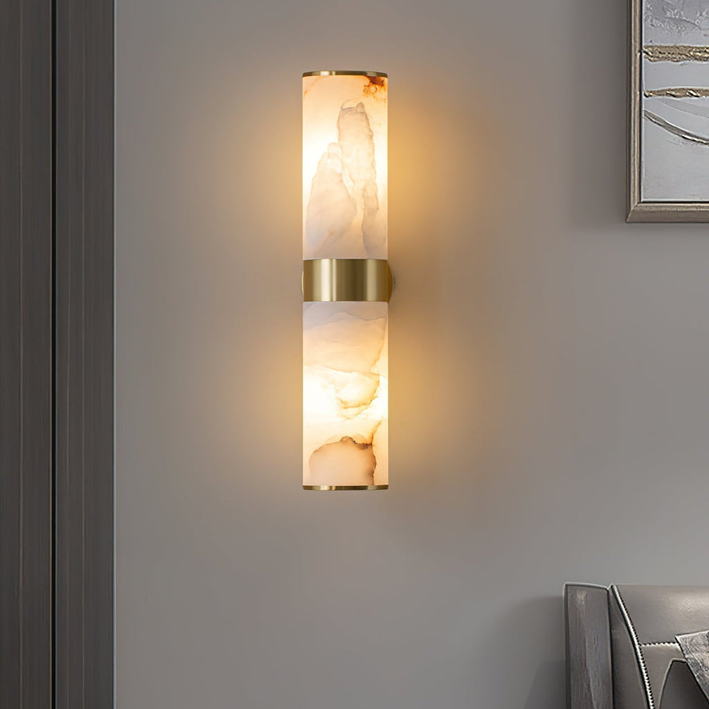 The Clérachic Sway lit to reveal caramel veining running through the natural alabaster shades.