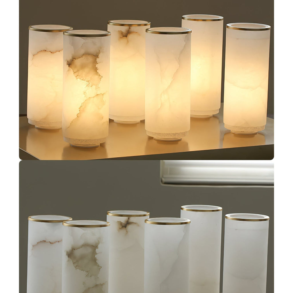 Clérachic alabaster shades shown lit and unlit side by side, revealing how the stone veining differs.
