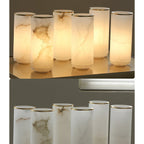 Clérachic alabaster shades shown lit and unlit side by side, revealing how the stone veining differs.