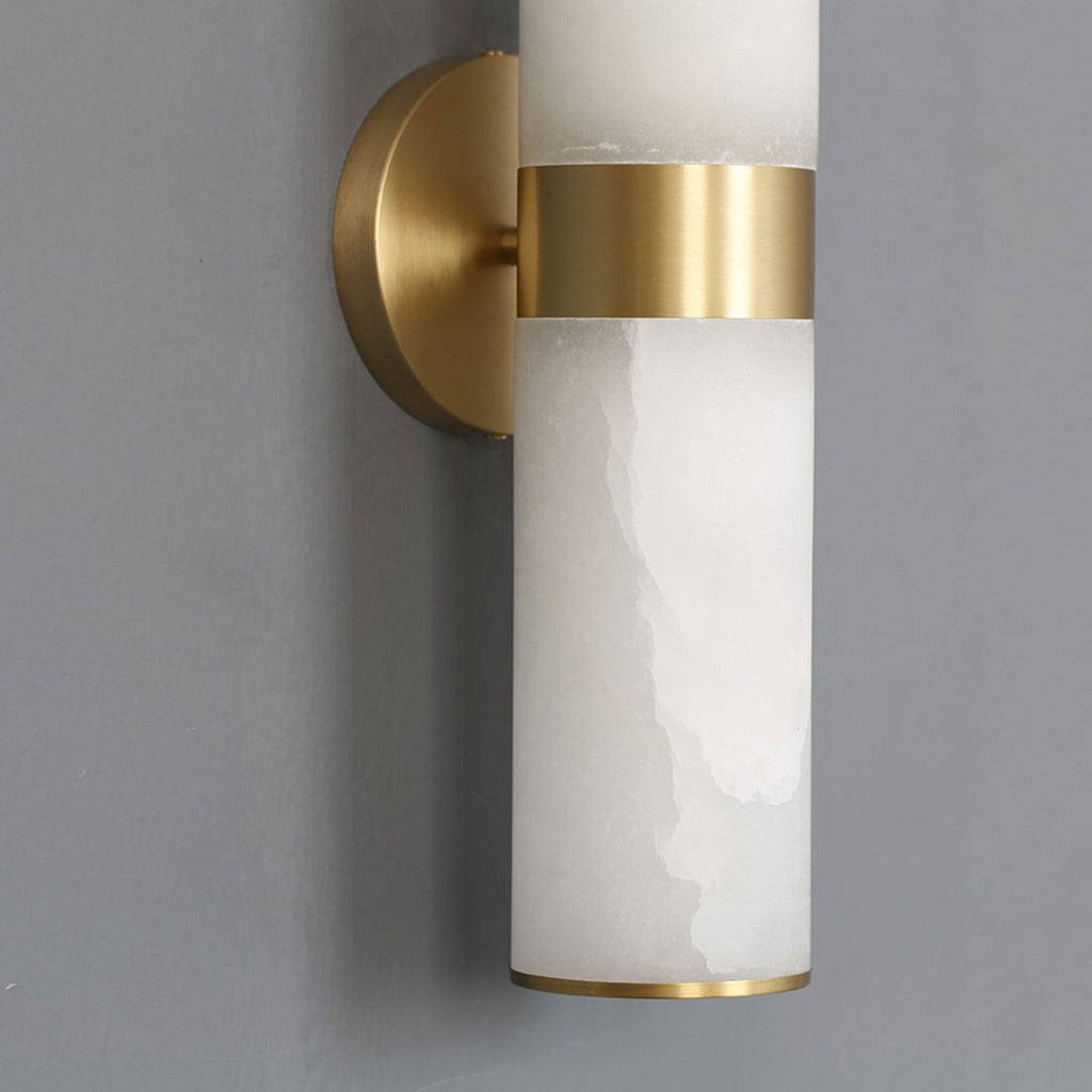The Clérachic Sway detailed at the wall, round brass backplate and stem meeting the polished collar.
