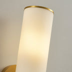 Clérachic Sway upper shade close up, a thin brass rim capping the softly lit alabaster cylinder.